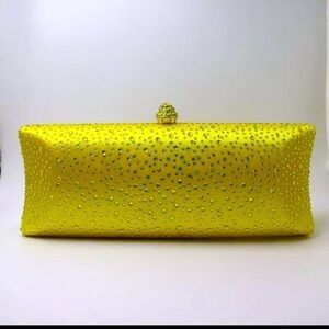 Yellow Rhinestone long clutch. With rhinestone enclosure and long chain